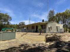  73 Boondine Rd Mokine WA 6401 $318,000 Further up in the hills, this property is tucked in at the end of the road with no traffic but the sound of peace and quiet on 8 acres of land. Hardi Plank Iron Home with a front and rear verandah which consist of 3 comfortable bedrooms 1-bathroom, Tiled floor open plan kitchen living, laundry & toilet area, separate bathroom, security already installed and solar panel system. Front door enters into the laundry, then the hallway passage with access to all 3 rooms. All 3 rooms have reverse air-conditioning, carpet floors and fan. The 2nd and 3rd room both have B.I.R. Kitchen area both shares the dining and living room which features tiled floors, gas stove & oven, reverse air-conditioning and woodfire. As you walk out the back door the home overlooks the fenced below ground salt pool, and has rolling rural views! The property also features; 2 large sheds & 2 garden sheds, 1 large concrete tank, 4 plastic tanks & 2 tin tanks located around the front side of the property. Also, asmoker oven, shade house, an Aquaponics set up which is a way to grow your own fish and vegetables at the same time but needs attention, Solar panel system connected and connected to scheme water and power. Firebreaks have been redone along the side of the property. Land Rates: $1605.60 approx. Water Rates: $264.36 approx. Contact Bob Davey on 0417 946 713 or Amber Keefe on 0400 936 247 to book your next appointment! 