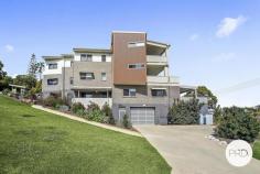  5/45 Jarrett St Coffs Harbour NSW 2450 $829,000 Elevated and North facing with glorious views to Coffs creek and the mountains this executive style unit could be the perfect retirement or downsizing opportunity. Located within walking distance of the Jetty restaurants, cafe's and the beach this home offers a simple lifestyle choice. Modern and spacious throughout and consisting of 3 large bedrooms, ensuite and main bathroom plus an open plan living, dining and kitchen area. The living area, dining area and kitchen all benefit from raked ceilings and are light filled and lead straight onto the ample sized outdoor entertaining deck. With quality finishes throughout including stone bench in the kitchen, floor to ceiling tiles in the bathroom and ensuite plus many other extras this home has got the lot. Parking is by way of a secure gate entry with your own DLUG once inside. If you've been looking for the perfect lifestyle opportunity in a great location then look no further. 