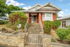  32 Hill Street West Hobart TAS 7000 $745,000 Situated in southern Tasmania's most highly sought-after suburb is this charming, solid brick home. Positioned on a corner block of the ever-popular Hill Street...location really is everything! Boasting 3 bedrooms and 1 bathroom the home is in a perfect location within close, walking distance proximity to Hobart's CBD, a popular children's playground and the famous Hill Street Grocer. A beautiful sunroom is off the main entrance and the home features multiple living areas, a separate laundry and a second toilet. The home also boasts significant under house storage and off-street parking is available from Allison Street. Character West Hobart homes are in high demand and short supply. Renovate or move straight in. This is a fabulous opportunity to purchase a fantastic property that is ready to move in to or add your own touches. Contact Simon for further details or to arrange your inspection. FEATURES: • 	 Air Conditioning • 	 Close To Schools • 	 Close To Shops • 	 Close To Transport • 	 Garden • 	 Polished Timber Floor • 	 Secure Parking 