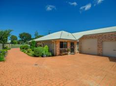  2/58 Tara Street WILSONTON QLD 4350 Looking to downsize and need the convenience of easy, low maintenance living? Then this is the perfect unit for you!! Set in a gated complex of 4 this light and bright quality built unit offers:- • Spacious open plan with timber look vinyl flooring and reverse cycle air conditioner • Well appointed kitchen with dishwasher • 2 built in bedrooms plus 2 way bathroom • Private courtyard with covered BBQ area • Garden shed + rain water tank • A bonus is the single garage with extra high roller door Enjoy a leisurely stroll to the Wilsonton Shopping centre, and it is only minutes to medical facilities and St Andrew's Hospital.. 