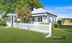  119 Shepherd St Bowral NSW 2576 $1,350,000 Lot 31. This Circa 1900’s home sits in a most enviable position - private and yet conveniently close to Bowral town centre. In (mostly) original condition, this pretty weatherboard cottage presents an opportunity to benefit from a renovation yet is ready for you to move into. Come and see if the potential suits you! Features include: Polished timber floorboards Lining boards Picture rails Slow-combustion wood heater Fireplace Workshed Verandah and deck Two living areas Study Sunroom Garden with established trees including an English Oak and mature Camellias.. 