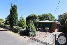  94 Albury Street Tumbarumba NSW 2653 $380,000 This 3 bedroom brick home is ideal for the growing family or even room to transition the in laws, Very fastidiously maintained inside and out with quality inclusions. The home features: 3 bedrooms all with built-ins, the main has a ceiling fan and an extended storage room Large sun filled rumpus room with builtins Combined dining/lounge room with wood heating + reverse cycle unit + ceiling fan, The skylight in the kitchen provides a light and airy feel, the kitchen itself has an immense amount of cupboard space, Stylish bathroom with old world charm - relax and unwind in the claw foot bath, Separate studio - Currently used as a craft room but would be ideal as a teenager's retreat, This is a very roomy home complete with a wealth of storage! Fully fenced yard (the classic front fencing was from an original manse) with low maintenance and established colourful gardens, Long concrete driveway for extra parking, enclosed carport with roller door, Multiple garden sheds 2,000ltr rain water tank. Close to the hospital, walk to town or even to the gym! Nothing to do but move in! 