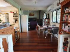  10 Fern St Blackbutt QLD 4306 $259,000 This 2 bedroom home has built in wardrobes, air conditioning in the main bedroom and both rooms have ceiling fans. There is also a sleep-out/entrance at the front of the home that could be converted to a 3rd bedroom. Lounge room is a good size with beautiful polished timber floors, a slow combustion wood fire and a glass sliding door opening out to a full length verandah down one side of the house. Kitchen features a gas stove top with electric oven and dishwasher. A large patio area at the rear of the home is the perfect place to entertain or sit back and enjoy the beautiful established gardens. Concreted and partly enclosed carport could accommodate 2 cars and if needed a trailer, large covered veggie garden, chook pen, rainwater tanks, garden shed, fully fenced and 21 new solar panels. Walking distance to school, doctors and shops. Book an inspection today. 