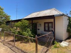  26/28 Burlong Rd Northam WA 6401 $145,000 Are you ready for a challenge? This Home is in need of a lot of love  Two titles totaling 1/2 acre  , one with a house on it and the other with the Garden shed and stand alone carport.  The house itself would have been an an original weatherboard and iron roof home , with Timber ceilings and Walls , it has had some extensions done since being built.    Currently it has 3 bedrooms  two living areas and a nice outdoor area, as well as a lovely front verandah.    Features include  Water and Power Connected  Wood fire  Pot belly  electric cooking  Electric Storage HWS  Chook pen Septic tanks .. 