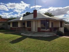  14 High St Goomalling WA 6460 $229,000 This stunning solid brick home is situated in the centre of town on a large 1457m2 corner block.. what a great location! Featuring 2 large spacious Bedrooms with BIR and ceiling fans plus a sleep out which you could make into a 3 bedroom or a second living area. Bathroom has a separate shower / vanity / bath. Lounge room is generous in space with entry from the entry way and then flows through to the dining room all living areas have beautiful, polished floorboards throughout. kitchen contains gas cooking facilities owner recently have installed a new gas hot water system and new evaporative air-conditioning large new shed /Workshop has no power however it does have a concrete floor and a garden shed for all your storage needs. This beautiful home is currently tented on a periodical lease so only minimal photos have been taken for personal reasons so please don't hesitate to have your own viewing as you will not be disappointed. 