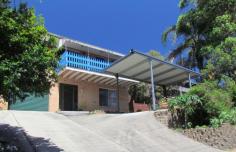  43 Cameron Street Maclean NSW 2463 $410,000 Located close to the TAFE, High School, showground and only 1.5km to Maclean CBD is this neat brick and tile two storey home will appeal to many. The lovely polished timber floors on the upper level are a feature as are the glimpses of Woodford Island from the front deck. The house boasts a great kitchen with open plan layout, plenty of storage with extensive cupboards and drawers plus ample bench space. There is plenty of room for your fridge and the dishwasher will be handy when entertaining friends and family. There is enough space for your dining beside the kitchen area, which then leads through to the lounge area complete with reverse cycle air-con. A ducted evaporative air-con system has also been installed. The timber stairs from the lounge lead to the upper level with polished timber floors and the four bedrooms. The functional design of the central bathroom is great and the tile selection gives the area a bright clean feel. All bedrooms are complete with ceiling fans plus BIR's to all bedrooms. There is access from the fourth bedroom that leads to good sized rear deck. The laundry offers good size and storage plus loo downstairs for convenience. The under stair storage area is immensely convenient, as is the remote control roller door to the single garage with internal access. The front of the property presents well with a generous concrete driveway to the lock-up garage, single carport and side area that is perfect to store your trailer. The driveway is framed by tiered gardens set within well-presented block retaining walls. The rear yard is terraced into two near level section with clothesline, established vegie gardens and mature mango tree. This home is handy to all that Maclean has to offer, so don't delay contact the listing agent Alan Bruchert 0458 495 172 to book your inspection today. FEATURES: • 	 Air Conditioning • 	 Built-In Wardrobes • 	 Close To Schools • 	 Close To Shops • 	 Close To Transport • 	 Garden. 