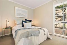  4/11 Towerhill Road Frankston South VIC 3199 $540,000 - $594,000 The perfect package for starters, single parents, downsizers or investors just 300 metres from Frankston High School, this adorable three-bedroom unit offers style and elegance, from the luminous bay window to the ferny courtyard garden. A fabulous find for savvy buyers in highly-sought Frankston South, the entry leads into a lovely living room with polished timber floorboards, floor-to-ceiling windows and retro-chic glass brick feature wall. Fitted with faux timber cabinetry, a gas cooktop and on-trend stainless-steel appliances, the kitchen is well appointed and gazes out to the leafy garden, which can be further enjoyed on the brick patio beneath the shade of tall palms. Three immaculate bedrooms with built-in robes boast a neutral colour palette, French windows and easy access to the full family bathroom, which includes a shower, bathtub and separate toilet for household convenience. A short walk to Overport Primary School, Towerhill Shopping Centre, Delacombe Park, public transport and a choice of takeaways, among the extras of this move-in-ready home are split-system heating and cooling, a dishwasher and 3 x 6.2-metre garage. Should you require any further information, please do not hesitate to contact Ash Weston on 0439 101 677 or Brooke Wegener on 0448 382 643 anytime. 