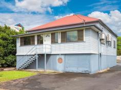  185 Union Street South Lismore NSW 2480 $499,000 Well exposed to the Bruxner Highway in South Lismore, this unique property has a B6 Enterprise Corridor zoning, offering a host of options for the astute investor or owner occupier. Situated on a 1058 square metre allotment, the highset dwelling has side access from Union Street and the added bonus of drive through access to and from Cromer Street. The home consists of three bedrooms, all with air conditioning, and the main with walk-in robe. The kitchen is modern with ample cupboard and bench space whilst the bathroom/laundry is in an original tidy condition. The loungeroom is air conditioned for added comfort and there are polished timber floors and high set ceilings throughout. An enclosed sunroom at the front of the home and a covered deck to the rear, completes the package. Downstairs is fully concreted and has an abundance of shelving for storage. The majority of the land is bitumen sealed providing off street parking and has the added bonus of an approved D.A for a 18 metre x 7 metre x 5 metre industrial shed. Seize the moment...seize the opportunity. 