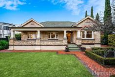  22 Lockwood Rd Erindale SA 5066 Elevated on an almost 1000sqm lot in a prime eastern suburbs location, sits this stunning character family home. Welcomed by a double width entry and decorative ceilings, the formal living features lead light windows and an open gas fireplace, providing the perfect setting for a cold winter’s night. The main bedroom with walk-in-robe and federation style en suite overlooks the manicured front garden, with two other spacious bedrooms offering built in robes and a third that could be used as either a study or 4th bedroom. An open plan rear extension holds a well-lit living and dining area, featuring a beautiful large, arch window. Alongside is the kitchen which has ample storage space, granite bench tops and finished with quality appliances – including an integrated fridge/freezer. Double French doors open out to a spacious sandstone paved entertaining area with water feature. Stepping up to a large, open grass area, pristine manicured gardens and a semi tiled, in ground salt chlorinated pool complete with solar heating Boasting a double garage, under cover carport and ample off street parking secured behind a gate it is perfect for accommodating the whole family. Other things to note about this property: – Front & rear gardens are fully irrigated with self-timer water system – Tiled roof – Paved driveway – Study area can double as Kids Living or Play Room – Jarrah timber floorboards – Terrazzo verandah – Zoned reverse cycle air-conditioning This beautiful home is close to primary schools such as Burnside & Marryatville primary as well as the prestigious Seymour College & St Peters Girls School. 