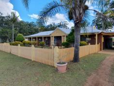  441 Williams Rd Benarkin North QLD 4306 $470,000 This Immaculate 3 bedroom brick home is situated on 12.6 acres in Benarkin. It has a Good size tiled lounge room, a spacious kitchen with electric stove, oven and large walk in pantry. Dining Room area has wood fire and sliding door to the rear veranda for entertaining. Large main bedroom with walk in robe and en-suite, built in wardrobes in both other bedrooms. Main bathroom has separate shower and bath, Good size laundry with sliding door to access the back yard and a separate toilet. The home is Tiled through the living areas and has wood flooring in the bedrooms, ceiling fans throughout, 2x Air conditioners in main and other 1 other bedroom. Sit back in the fenced back yard and enjoy the peaceful surroundings, established gardens, large undercover area with brick BBQ, a bridge crossing over a fish pond with pumps gives the tranquil sound of the running water to just sit back and relax. 2x large water tanks, 2 garden sheds, good size workshop shed, an old style machinery shed for storage or parking. This property has 2 large dams one with a pump to water the gardens and established macadamia nut trees, mango trees and a mulberry tree. This property is newly listed, book an inspection today.. 