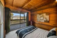  48 Harbour Line Drive Goughs Bay VIC 3723 $420,000 - $450,000 'Bunderra' is the perfect holiday home situated off the main road on a private 960sqm block boarding nature reserve, offering a summer deck with lake views and gorgeous native outlook. There is plenty of under house storage ideal for keeping your boat or cars out of the weather plus a single lock up garage. Inside it is very warm and cosy with a great fireplace and new split system, solid timber kitchen complete with Bosch dishwasher, electric whirlpool free standing oven and pantry. Large windows in the living room capture beautiful lake views, plus two bedrooms both with built in robes and functional main bathroom/laundry complete this perfect rural retreat. • 	 Perfect holiday or air b n b home in private location • 	 Decking with lovely rural vista adjacent to nature reserve • 	 Lovely lake view from the living room • 	 Just moments to the lake and 20 minutes to Mansfield Goughs bay is a sort after location for those who love to ski on the water or rug up for snow in the winter, take advantage of the local state forest with ample 4WD, motorbike tracks to explore! 