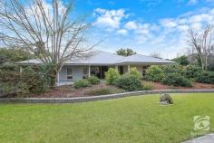  50 Huon Creek Road Wodonga VIC 3690 $960,000 This beautifully renovated home is sure to excite all who enter, but the best part is the separate unit for a "Special Nanna" or additional income stream. Solidly built, this 1980s, cream brick veneer home offers all that a family could require. Four generous bedrooms (with built-in robes), two bathrooms, a home office with built-in furniture, and two living areas. Then there is the stunningly renovated 2pak kitchen, complete with stone benchtops, a proper butler's pantry, induction cooktop, pyrolytic oven, and dishwasher. Ducted heating and cooling throughout the home make for year-round comfort for your family and being a block of 2170m2 will give everyone room to play, grow vegetables or just relax. Your outgoings will also be reduced with a 10kw solar system. This tremendous-sized block is enhanced by the fact that you have rear yard access for a caravan, trailer, or additional cars as well as two carports at the front with the curved driveway and more parking spaces. There is no shortage of storage in this well-balanced home with additional cupboards in the kitchen, laundry, and hallways. Added to this is a workshop with 15amp power and a garden shed. The pool is low maintenance, saltwater, and self-chlorinating. Paved, covered and right beside the pool, is a beautiful, private outdoor kitchen, featuring a BBQ, glass door wine fridges, lots of bench space, and hot & cold running water. Plenty of room here for an outdoor lounge and dining area so you can relax whilst you watch the kids playing in the pool. Included in the covered area is the breezeway leading to the modern Granny Flat. And what a lovely home this would make for Nanna or a maturing child who needs a little independence. An open-plan lounge/dining/kitchen and a separate bedroom with ensuite and built-in robes come together to provide a safe haven, with the added benefit of the use of the beautiful outdoor area. 