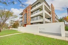  34/18 Kennedy St Kingston Place Kingston ACT 2604 Stage One - Kingston Place, positioned in the heart of old Kingston, offers the astute purchaser the best of both worlds: a near-new residence with luxury finishes, common-sense design features and a tranquil position. Finished with a combination of granite Benches, Gaggenau appliances (including induction cooktop, oven and microwave), glass splash-back, full height and feature tiling to wet areas, built-in shelving for entertainment equipment, ducted heating and cooling, floor-to-ceiling glass sliding doors from both the living room and bedroom, high ceilings and walk-in robe offering plenty of storage and hanging space; this home presents as the ideal residence for the discerning executive couple. Imagine your new home situated conveniently within walking distance to the village lifestyles afforded by Kingston and Manuka, yet also having an expansive, fully enclosed and paved outdoor north-facing courtyard with planter boxes; enabling a seamless flow from the luxury-appointed, open-plan kitchen, lounge and dining areas into your outdoor entertaining areas complete with the serenity and privacy offered by this desirable location.  Property sold with vacant possession. Features: • Gaggenau kitchen appliances with induction cooktop, oven and microwave; • Granite benchtop; • Built-in shelving for entertainment equipment and desk area in living room; • Spacious walk-in robe; • Lift access; • Stone bathroom benchtops with double vanity; • European laundry; • Secure building with Audio visual intercom entry; • Fully ducted, reverse-cycle air conditioning; • Ducted reverse-cycle AC; • ADSL2 and Foxtel connection points; • Living area of 72 m2 and Terrace-courtyard of 53 m2; and • One allocated parking space and lockable storage cage in secure underground garage. • Security System 