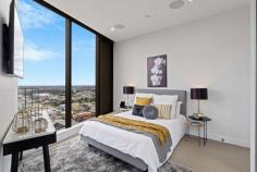  2605/421 King William Street Adelaide SA 5000 $899,000-$949,000 This luxurious two-storey penthouse apartment will make you feel like you're on top of the world! Prestigious executive living is yours to enjoy, with stunning views and a state-of-the-art quality interior. A spacious open plan living and dining area has parquetry oak flooring, modern fireplace, and an up-to-the-minute Samsung TV, theatre system with multi-room audio and RTi iPad/RX7 touchscreen system. Floor to ceiling windows showcase the staggering views across to the coast. Step out onto a private balcony and share a bottle of wine while the sun sets. The gourmet kitchen is a chef's dream. Miele appliances, induction cooktop, built-in fridge, dishwasher and even a coffee machine are included alongside quality granite bench tops and sleek cabinet storage. There are incredible views from both bedrooms, with the main bedroom in a coveted corner position. Both the en suite and main bathroom are gorgeous, with marble floor-to-ceiling tile and a dual vanity to the main. Entertaining? Step up to your own private rooftop entertaining balcony, complete with full outdoor kitchen. Fully fitted with a barbecue and bar fridge, you can kick back and let the good times roll! An additional store room is a huge bonus. Vue on King William is an award-winning building designed for upscale living. A full sized pool and sun deck, plus quality recreational gym, are available for use on level 7. An intercom system offers peace of mind, and there are two secure car parks assigned to you. Live in the centre of Adelaide and explore everything this exciting city has to offer. Exciting gourmet eateries along Gouger St, the fresh produce in the famous Central Markets and some of the best coffee shops in the world are all within a short walking distance. The free Adelaide tram stops just outside the door, making it easy to get around the CBD. Or take a ride to Glenelg! Adelaide is host to a swathe of prestigious schools and every amenity you could want. This is a true lifestyle opportunity for the discerning buyer who only wants the best. A must to inspect! What we love: . Amazing central location close to cafes, markets, entertainment and public transport . Gorgeous two-storey penthouse finished to perfection . Exclusive rooftop entertaining balcony with outdoor kitchen . Panoramic views from almost every room across to the coastline and hills . Gourmet kitchen with Miele appliances . Stunning upscale en suite and main bathroom . Samsung TV, theatre system, multi-room audio, RTi iPad/RX7 touchscreen system . Ducted reverse cycle air conditioning . Floor to ceiling windows . Superbly finished to the very highest quality throughout . In award-winning Vue on King William, with pool and gym . Two secure car parks 