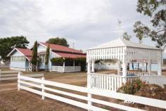  61 Perceval Street Leyburn QLD 4365  $239,000 Set in quite lazy town of Leyburn, this Queenslander style home has loads to offer, sitting on a massive 3,794m2 sub dividable corner block the possibilities are endless. VJ walls, high set ceilings, timber flooring and the comfort of cosy wood heating are all on offer. The modified kitchen has a solid timber island bench, electric freestanding stove and loads of bench and cupboard space, stylish timber balustrade separates to the formal dining area. Spacious lounge room leads into separate office/sunroom. Three generous bedrooms at each corner of the home with the main featuring huge mirrored built in wardrobe and wall air conditioner. Entertain family and friends under the full length covered outdoor area. Even more covered space at the rear of the home where a second toilet and laundry is situated. Rustic and original timber garage offers two car accommodation plus additional single carport. Leyburn comes alive once a year for the Historical Leyburn Sprints. Watch all the action from the comfort of your Gazebo situated track side! This family home has got so much to offer with the added value of a possible sub division. Allotment - 3894m2 General Rates - $1,150 approx per 1/2yr including water access When inspecting a property, the following guidelines will be required, and your assistance appreciated – Physical distancing should always be observed. No more than one person per 2 square metres for areas open to or used by guests or patrons, whether indoors or outdoors. All persons to remain at least 1.5 metres away from other groups where possible. The agent conducting the inspection will complete and retain (and produce for inspection as may be required), a written/or digital collection notice that complies with all legal requirements and directions. 