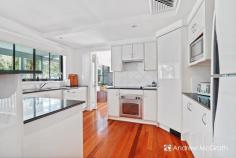  610 Currawong Circuit Cams Wharf NSW 2281 $1,290,000 to $1,390,000 This 4+ bedroom family home nestled in the heart of Cams Wharf is all you've been waiting for. Featuring a modern kitchen and multiple living areas as well as the outdoor alfresco will be an entertainers dream This stunning, free standing residence is arguably one of the largest and finest homes in Rafferty's Resort. Enjoy lakeside living at its best with everything Rafferty's has to offer, including volleyball, tennis, boating, canoeing, swimming and peaceful walking tracks through the gorgeous grounds. Appreciate this lifestyle and make every day feel like a holiday, or invest long term as a permanent rental or short term holiday accommodation. Appointed with quality inclusions and a high quality finish an inspection is a must. * Generous living area, filled with natural light * Combined lounge and dining area * Gorgeous kitchen with granite bench tops, and stainless steel appliances including an oven and dishwasher * 4 large bedrooms; all with built- in wardrobes * Retreat style main bedroom with ensuite and wardrobe * Additional room off bedroom 4; could be easily used as a 5th bedroom or lockable owners room * Main bathroom with gorgeous wall to ceiling tiling and a bath tub and shower * Plantation shutters, modern lighting and beautiful timber floorboards feature throughout * Ducted-air conditioning and security * Extra-large 3 car garage with additional depth to accommodate your boats and trailers * Covered entertaining deck area; perfect for catching up with family and friends * Private upstairs balcony with a leafy outlook * Great storage space located under the stairs * Ducted Vacuum System * Access to all resort facilities - Tennis Courts, Pools, Boat Ramp and enjoy a quiet drink down in the Restaurant at your leisure, they even take the garbage out for you! Currently rented to excellent Tenants until March 2022 at $600 per week. KEY FEATURES: Built in Robes Dishwasher Ensuite Floorboards Hot Water Electric Deck Fully Fenced Outdoor Entertainment Pool (In Ground) Remote  Garage Tennis Court Ducted Cooling. 