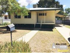  12 Quandong Street Blackwater QLD 4717 $150,000 For Sale is this Quaint 3 bedroom home on Quandong street. Covered timber entry landing is the perfect segway to the home. Enter into the semi open plan lounge and dining.  Nearby is the super Tidy kitchen with plenty of cupboard space and solid cabinetry. A Practical bathroom with shower over bath and convenient laundry. The wet areas are finished with a easy clean laminate flooring. 3 good sized bedrooms, each is complemented by ceiling fans, builtin robes and security screens Outside is a single carport, a garden shed for storage and a fully fenced yard. Call 49826055 for further details. Currently tenanted. 