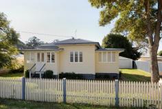  75 Rome Street Newtown QLD 4350 Located in a quiet position within east walking distance to St Ursula's College and Our Lady of Lourdes School. • 3 large bedrooms • Modern bathroom • Separate lounge; Separate dining • Front sunroom/office • Modern kitchen with stainless steel appliances • Polished timber floors; Air conditioner; Natural gas; Ceiling fans • Fenced block with rear access to double garage • Small rear deck; Good size back yard • Rain water tank. 