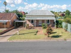  121 Murray Street Rutherglen VIC 3685 “Period” cottage style home in the heart of the popular and vibrant Rutherglen township adjacent to local park, swimming pool, Lake King and short walk to the town’s Main Street, Rutherglen Golf Course and Bowls Club. A truly convenient location. The residence boasts original details and characteristics throughout including ‘sky high’ ceilings and polished timber flooring. Comprising of three (3) generous bedrooms all with BIR's, ‘cosy’ lounge room, full bathroom, convenient laundry, and open modern kitchen/meals area. Outside the 700m2 (approx.) allotment offers a great timber deck overlooking a spacious lawn area, a front verandah with views over Lake King, 9.1m x 6m shed and a single carport. The size and position of the home on the allotment leave the opportunity to add further inclusions (e.g. pool, shed) extend the dwelling or build a unit/granny flat (S.T.C.A). Other features include: - Overhead fans - Split system heating and cooling - Gas appliances - Dishwasher. 