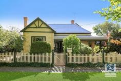  21 Loch Street Beechworth VIC 3747 $870,000 - $890,000 A beautifully presented Victorian weatherboard home in central Beechworth, with the period charm you would come to expect. You are warmly greeted by the L shaped, bull nosed veranda upon entering the property via the picket gate and fence. A long traditional hallway with high ceilings sets the tone for this grand residence. Once the former parlour, a delightful lounge room with pressed metal ceiling is the perfect place to relax after your working day. Sitting in conjunction with the formal dining area, it features split system reverse cycle plus gas log fireplace. The kitchen is impressive in size, with ample storage, and can cater for large groups. It features laminate cabinetry, gas cooktop, electric oven plus an Everhot slow combustion stove, and Bosch dishwasher. All bedrooms are generous in size, each with their own private outdoor sitting area, split system reserve cycle unit and bathroom ensuite. The upstairs bedroom is accompanied by its own lounge or sitting room plus a covered north facing deck, making it the perfect parent's private enclave. Hidden extras include a 5kW solar inverter and panels, three off street parking bays, and rear paved courtyard, all contained in one of Beechworth's most beautiful tree-lined streets. You could not possibly trump this properties presentation and location. Situated only one block from the main retail and restaurant hub, this delightful home is quintessential Beechworth. The features of this beautifully maintained property are many and must be inspected to be appreciated. Call today for your inspection. 