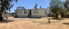  3 Broadbent St Wongan Hills WA 6603 $170,000 3 bedroom 1 bathroom home sitting on a 1012sqm block. Ducted A/C throughout the main living areas & bedrooms of the house. Carpet to the front entrance, lounge room, hallway & bedrooms. Basic kitchen/dining with gas cooking & plenty of room for improvements. Bathroom comprises of a single vanity & shower bath combo recess. Small decking out the back with basic pergola for entertaining. Large backyard with plenty of space for that chook yard, vegie patch or why not both!! Double garage with power & driveway access is situated at the side of the house. With a little attention this home would make a great little investment.  