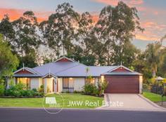  103 Dunsborough Lakes Drive DUNSBOROUGH WA 6281 $1,600,000 Lovingly cared for and meticulously maintained; these are only the start of the benefits of this home. Located in Dunsborough, this property sprawls across 2,212sqm, has a stunning rural aspect and is only 2 kms from the town centre. Here you can experience the best of both worlds – convenience of location to town life, school bus stops, cafes, coffee shops, sports grounds and the additional bonus of the sense of country life and resort feel gardens. Local owners have made this house their home and paid close attention to the upkeep of the property including the expansive yard, gardens, alfresco and plunge pool area. Certainly, the outdoors is ideal for children to run free and explore, making this a perfect family home, entertainers delight or holiday getaway. Space is in abundance with this impressive oversized home which showcases an enormous and extensive chef’s size kitchen with plenty of storage and high-end appliances such as two new Bosch 600mm ovens, 900mm induction stove top, dishwasher, appliance cupboard and walk-in pantry, plus Essastone benchtops and island bench. The family or guests can find seclusion in one of the two lounge room areas, or separate theatre room and each of the minor bedrooms are generously sized with built-in robes and are located around the main bathroom. The master suite is a private sanctuary away from the remaining bedrooms located at the rear of the home measuring 5m x 6m, plus large en-suite, double shower, corner bath, stone benchtops, double vanities and large walk-in robe. There is also plenty of room for the family to gather or to entertain friends in the open plan living/dining room area, opening with sliding doors onto the alfresco (46sqm), which overlooks the impressive yard and resort styled gardens, all north facing. Storage has been well thought out in this home, with two separate walk-in storage rooms and for the man that needs his own space – a double garage, with semi-separate man’s cave/tool room, with easy access to the main entry. If you’re looking for somewhere to make your forever home, with the benefit of space and lifestyle, something for all of the family and nothing more to do than move in and enjoy, then an inspection is a must. Other home features include: • Large open-plan living area with family dining room • Raised 35 course ceilings • Feature built-in Maxiheat fireplace • Extensive chef’s kitchen with an abundance of storage • An impressive aspect over the yard and beyond from the alfresco, kitchen and living area • Two bathrooms plus powder room • Double garage, with semi-separate man’s cave/tool room, with separate access • Ducted reverse-cycle air-conditioning • Plico solar system with battery storage power connection • Quality window treatments throughout • Instantaneous gas hot water system • Water filter on kitchen tap • 130mm wide jarrah timber floor boards throughout main living and kitchen areas • Two walk-in linen/storage room • NBN connection Outside the benefits of this home continue: • North facing large alfresco/outdoor entertaining area (46sqm) • Fully fenced jarrah deck plunge pool area • Beautiful rural views beyond the yard • Side access for the boat, trailer and caravan • Reticulated gardens • Outdoor shower (cold) • Vegetable garden • Fruit trees • Fire pit area • Small potting shed at the rear 