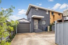  4/1 Addicott Street Frankston VIC 3199 $410,000 to $450,000 An absolute gem of easy living in footsteps to Frankston city centre, this superbly presented one-bedroom townhouse impresses with its contemporary aesthetic, stylish finishes and comfortable layout. Walking distance to Monash University, Chisholm, the train station, the Homemaker Centre and Bayside Shopping Centre, with the beach just beyond, the property is suited to starters, downsizers and investors alike, while the Beach Street shopping strip just 100 metres away further bolsters the appeal. Cleverly crafted across two light-filled levels to maximise the space and light, the residence delights with a lovely living room on the entry level with timber flooring, muted grey tones and plantation shutters. A tidy kitchen with breakfast bar, oven and gas cooktop is fitted with a walk-in pantry, while outside a north-facing private terrace offers a sunny space to relax outdoors or enjoy a drink with friends before strolling into Frankston's entertainment precinct for dinner and a movie. Peaceful and private on the upper level, the huge bedroom boasts mirrored built-in robes and ensuite-style access to a pampering modern bathroom with shower and soaker tub. Including split-system heating and airconditioning on both levels, a brand new washing machine connected in the bathroom and a garage, this move-in-ready retreat is a ripper find in a wonderfully central locale. 