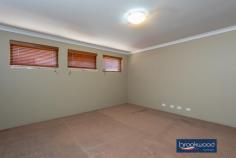  535 Horwood Rd Swan View WA 6056 $799,000 Options here with R12.5 zoning delivering the possibility to create a dual occupancy (STCA), subdivide now or later at the top of this elevated lot. Do it now or save it till later. Open the door to light filled living in this generously proportioned family home. Multiple living areas, easy – care landscaped gardens, and a large sheltered outdoor entertainment zone give a growing family flexibility. 4 bedrooms 2 bathrooms 2006 Summit brick & iron Open Plan central living Family-sized media room Separate activity room Main suite WI robe ensuite North-facing paved alfresco Easy-care landscaped gdns 1733 sqm with R12.5 zoning Close schools trail nat park Timber-look floors carry you along a wide central hallway past the spacious main suite, a separate media room, and on to a kitchen/meals/ family room arranged at the rear of the floorplan. Double doors connect this central living area to a separate activity room, while a sliding door to the large, north-facing alfresco entertaining creates seamless indoor-outdoor living. The galley-style kitchen features a long benchtop with an integrated breakfast bar, an electric oven, a 4-burner gas hob, and a dishwasher. Large windows fill this family hub with garden views and access to a paved outdoor living area surrounded by lawn, stone walls and a green screen of neatly clipped trees. An electric log fire at one corner of the open plan living space and ducted evaporative cooling throughout the home provide year-round comfort. The main suite sits at the front of the floor plan to offer a sense of privacy. Timber-look floors, timber blinds, and generous proportions create a calm and inviting parents’ retreat. A walk-in robe, split system air conditioner, and an ensuite with a separate WC bring comfort and convenience. A sense of space and pampering continues in the large media room, where plush carpet and ample room for a big screen and family-sized sofa set the stage for at-home movie nights. In the separate junior wing, three newly carpet bedrooms with built-in robes, a shared family bathroom with tub, shower, and vanity, and a separate WC give kids of all ages a space of their own. Family life can be hectic; this home is designed to make your days a little easier: a double garage with automatic entry, nearby schools, links to arterial roads, and easy access to walking and riding trails. And with the potential for subdivision or dual occupancy (STCA), multi-generational living or additional income could bring further benefits. 