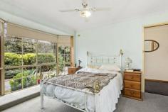  7 Chunar Grove McCrae VIC 3938 $900,000 - $990,000 On a generous 803sqm (approx.) parcel of land, this cherished and well-maintained 3-bedroom home would be a lovely permanent home or holiday retreat close to the beach. Cosy, comfortable and completely liveable as is, it's perfect if you are looking for a modernisation project to live in while you renovate, plus with glimpses of the water from the front, you could add a 2nd storey (subject to council approval) to provide beautiful bay vistas. All just moments to McCrae/Rosebud amenities and stunning beaches. - Spacious L-shaped lounge with wood heater set within a brick fireplace, plus large dining area - Farmhouse-style kitchen with abundant storage, copper rangehood, double sink with garden view - Master bedroom with ensuite and WIR, plus 2 bedrooms with BIRs - Central bathroom with bath and separate shower - Laundry with storage and garden access to large partially-undercover patio and built-in BBQ - Split system reverse cycle air-conditioning unit in lounge & new gas heater to dining - Private, fully-fenced back garden with multiple fruit trees and ample lawn space - Large circular driveway around attractive easy-care gardens and a double garage - Close to freeway access and all the delights of Mornington Peninsula 