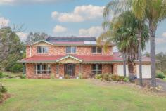  50 Brokenback Road Branxton NSW 2335 $1,100,000 to $1,200,000 Majestically seated on 2.84 acres, this expansive home is ideal for a large family. It is located in a peaceful street of Branxton, close to local shops, schools, and a short drive to the New Huntlee Shopping village, the Hunter Expressway & so much more. Enjoy all the city conveniences with town water and sewerage, NBN, and school bus at your door. All of the land is fully fenced and ideal for horses, pets or just needing room for the kids to play. Offering something for all the family, this fantastic property includes a sizeable 3-bay shed with an extra toilet, plus a sparkling inground pool for everyone to enjoy. This character-filled two-storey home greets you with a vast entry hall that allows you to choose which direction you wish to walk. An open-plan living area flows through to a formal dining room and into the modern kitchen. This kitchen offers loads of storage, 40mm stone bench tops, stainless steel appliances and a large window that overlooks the pool and entertaining area. A free-flowing floor plan with five bedrooms is on offer. Four oversized bedrooms are located on the upper floor, with the fifth bedroom on the lower level, all bedrooms include built-in robes and ceiling fans, whilst the master consists of a large walk-in robe and ensuite. Three modern bathrooms, with the main bathroom including a free-standing bath. This home has multiple living areas, while the games room is sure to impress with its cathedral ceiling and large enough to fit a full-size billiard table, giving you plenty of space for the whole family. Additional features include a great-size double garage with internal access, ducted air conditioning throughout for that all-year-round comfort, and a wood fireplace to keep you cosy in winter, 3.5 KW solar system and solar hot water. Outside the home gives you easy access to park trucks, caravans or boats. Simply move in and enjoy! 