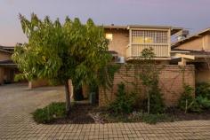  2/39 Leonora St Como WA 6152 Situated on the desirable river side of Como and with no common walls, this spacious three-bedroom townhouse provides the ideal lock and leave in the perfect location! Set back from the road in a boutique complex of just four units, this townhouse is within a well-maintained group with beautiful gardens and has a functional floor plan. The ground level features an open plan kitchen, meals and living area. The kitchen is spacious with plenty of bench space and cabinetry for storage. There is also a laundry area and WC which has direct access to the rear courtyard. The upper level features a large master bedroom featuring built in robes and a private balcony and two additional, generous-sized bedrooms all with built-in-robes. These are serviced by a family bathroom including shower and separate bath with a separate WC across the hall. Externally, the property features both front and back courtyards. The covered patio over the rear courtyard flows off the meals area and is ideal for entertaining all year round! Additional features of this home include split system air-conditioning to the master and ceiling fans to the secondary bedrooms, reverse cycle air-conditioning, good sized lock-up store room, under stair storage and tandem carport. The home is well located close to a number of public and private schools, Preston Street Precinct and Waterford Shopping centres, Curtin University, Melville Waters and just a 5 minute stroll to Canning Bridge train station. 