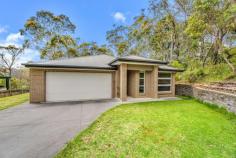  87 Minni Ha Ha Road Katoomba NSW 2780 $890,000 - $950,000 This near new spacious family home is near new and only built in 2017. Situated on a large 809m2 block, this modern home is big enough for a large family with 4 generous bedrooms with built-in wardrobes ( walk-in wardrobe in main bedroom) and also a Media room which can double as a 5th bedroom. The large living area is open plan featuring a modern kitchen with stone benchtops, stainless steel appliances featuring a 90cm gas cooktop, dishwasher, oven adjoining the living/dining area opening onto a rear undercover entertainment deck in the backyard. The home also features a conveniently large garage with enough room for vehicles and extra storage. The garden area is the one place you can add value to this home by adding your own landscaping. If you need public transport, no problem, the bus stop is only 20m away and it will take you directly to Katoomba town centre and station. For nature lovers the location is a very ideal distance of only 350m to Minnehaha Falls Track, so you can be in tranquil nature in no time. Features include: Quiet location Spacious 809m2 block Near new modern home Large Open Plan living area Modern Kitchen with stainless steel appliances and stone benchtops 4 Bedrooms with built-in wardrobes ( ensuite and walk-in wardrobe in main bedroom ) Media room which can double as a bedroom Tiled floors in living area 2 Modern bathrooms Carpet in bedrooms Blinds on all windows Gas bayonets Instant gas hot water Alarm system Spacious yard with enough side access to house a caravan Bus stop only 20m away 350m walk to Minnehaha Falls Walking track 