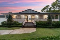  18 Hereford Close KINGSHOLME QLD 4208 Nestled on a secluded 4,968sqm block in the luxurious Montego Hills Estate, surrounded by lush native bushland, lies this grand and opulent 567sqm custom design residence. Built in 2018, this luxurious abode offers ample space and an array of lavish features to cater for every need. As you enter the property, you are greeted by the grandeur of the main entrance, which flows throughout both storeys and culminates with a ceiling that soars to over 4 meters high. The large proportions of the residence are evident in every room, making it perfect for both family living and entertaining guests. The property boasts 6 bedrooms, all with built-in wardrobes/walk-in wardrobes, providing ample storage space. The 2 main bedrooms, one upstairs and one downstairs, are the epitome of luxury and both feature walk-in wardrobes and ensuites, allowing for complete privacy and convenience. The home features 3 bathrooms + a powder room, all with Caesarstone benchtops and Carrara marble features, exuding luxury and opulence as well as 3 separate living areas, each designed to provide the ultimate in comfort and relaxation. The large open plan kitchen, lounge, and dining room features a faux fireplace (gas), perfect for chilly evenings. The media room is designed with acoustic insulation in the walls, providing the perfect space for movie nights with family and friends. The large multi-purpose room or 7th bedroom with built-in cupboards is perfect as a guest room or even a home office. The gourmet kitchen is a chef's dream, equipped with Caesarstone bench tops, a 900mm gas cooktop, electric oven, dishwasher, ducted range hood and Carrara marble splashback. The butler's pantry and study nook are off the kitchen, providing ample space for meal preparation and storage. The separate laundry room also features Caesarstone bench tops and ample storage and cupboards, making laundry a breeze. The property also features a 22,500L in-ground rainwater tank, Krystel Kleer (BioCycle) wastewater treatment system, insulation in all internal and external walls, floor, and ceiling, and acoustic insulation in between storeys. The property is also equipped with security doors and screens, fly screens, ceiling fans, and LED downlights throughout. It has a bottle gas hot water unit and is NBN connected with data points in every room hardwired for internet connection. This residence is truly a masterpiece, seamlessly blending luxury and functionality. With its grand proportions, spacious living areas, and an array of luxurious features, this property is the epitome of luxury living. Features: • 567sqm custom designed residence on a secluded 4,968sqm block • Built in 2018, with grand entrance and high ceilings • 6 bedrooms with walk-in robes and ensuite in main bedrooms • 3 bathrooms (plus a powder room) with Caesarstone benchtops and Carrara marble features • 3 separate living areas and a gourmet kitchen • Double lock-up garage and separate laundry • In-ground rainwater tank, wastewater treatment system and insulation throughout • Security features, LED downlights and Bottle gas hot water unit • NBN connected and data points in every room • 19.61kw Solar System 