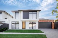  15A McCann Ave Glenelg North SA 5045 $1,250,000 - $1,325,000 This brand new, 2023 custom built home, is ready for you to move straight in. From the minute you arrive you will be impressed with the look and the quality - completed by A + L Homes where care and craftsmanship is their priority. Only metres from the fairways of Glenelg Golf Club and the local family friendly parks. The clever, architecturally designed, layout is perfect for the family with older children and being on a smaller easy care allotment means that you get your weekends back. 4 generous bedrooms, all with built in robes (walk in for the downstairs master of course) and a study or 5th bedroom gives plenty of accommodation options. The upstairs retreat is large enough for a lounge and television. Quality finishes abound whether it be the fully tiled bathrooms, stone benchtops or exposed aggregate driveways and paths - this is what you would have built but without all the hard work. The open plan living incorporating the well appointed kitchen (Smeg appliances) and pantry giving the cook the ability to be a part of the action. Large windows bring outside in with clever nooks for outdoor entertaining. With plenty of extras including extensive carpentry, V groove panel detail, large air-conditioning unit, alarm system, large laundry and downstairs powder room with toilet - you will want for nothing. 