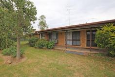  1 Stanley Street Thangool QLD 4716 $299,000 Positioned on a corner allotment in Thangool, only 11* minutes from Biloela, this low set brick residence is the perfect entry point into the property market. The friendly town of Thangool has a local pub, a service station, parkland, and the reputable Thangool State School, which are all within walking distance from the property. The home boasts a modern color scheme and a practical floor plan. With all of the hard work already done, this home is ready for new owners to move straight in. All bedrooms have ceiling fans and built-in wardrobes. The master is air-conditioned with a walk-in robe that has been hidden behind full-length mirror doors. The fourth bedroom has access through to a two-way bathroom, making for the perfect guest room. The family bathroom has been thoughtfully renovated with modern, clean tones and a separate bath and shower. The combined dining room and kitchen is air-conditioned and has a spacious pantry, roll out drawers and a dishwasher. The living room is off set from the dining room. The side entertainment area is under-covered with a single vehicle carport and has direct access to the internal laundry. A fully fenced 1,047sqm* allotment with a 4x4m* lawn locker and plenty of room for a shed. This is an outstanding opportunity to acquire a well-presented brick home in Thangool. 