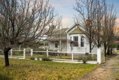  62 Last Street Beechworth VIC 3747 $920,000 - $940,000 If you've ever dreamed of owning a beautifully renovated period-style home in Beechworth, then look no further than 62 Last Street. As you step inside, you'll be greeted with its long, wide arched hallway and high ceilings. Throughout the home, you'll find new carpets that add a touch of elegance, and fresh paint that breathes new life into every corner. A formal lounge boasts an ornate cast iron fireplace and mantle. Beautiful bay windows adorned with floor-to-ceiling window furnishings allow natural light to flood the space. Additionally, there's an expansive open-plan living and dining area that perfectly complements the rear of the home. The kitchen itself is a delight, filled with natural light and a spacious layout. It features timber benchtops, gas cooking, dishwasher with a convenient central island. Experience year-round comfort in this delightful home. Both living zones are equipped with split systems, ensuring a pleasant environment throughout. All three generously sized bedrooms are fitted with their own split systems, two with BIRs, offering ample space for a growing family and individual comfort preferences. The master bedroom exudes warmth and charm with an inviting wood heater and pressed metal ceiling, creating a cosy atmosphere. Indulge in the luxury of the freshly renovated central bathroom, complete with floor heating, deep bath and walk-in shower, ensuring a blissful retreat during the colder months. There is a convenient separate toilet. A spacious laundry is accessed from the rear and includes a second shower and toilet. Step onto the rear veranda and you'll find a paved outdoor entertaining area, complemented by deciduous vines that provide year-round appeal and shade. The low-maintenance garden is adorned with vibrant plantings of birch, ornamental pear, roses, and more. The raised vegetable beds are tucked away, offering plenty of space for the kids to play in the expansive backyard complete with a cubby house. This is a home that seamlessly combines the best of classic and contemporary living. It is conveniently located within close proximity to schools, health facilities, nature reserves, and the central shopping precinct. 