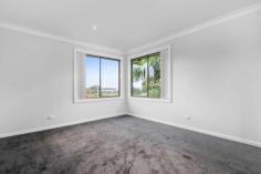  9 Walbon Crescent Koonawarra NSW 2530 $700,000 - $750,000 If you have been looking for a large family home with views then this is it! Featuring 5 bedrooms, the large main bedroom features a parents retreat and a balcony with views over lake Illawarra, spacious formal lounge room which leads through to the modern kitchen with stainless steel appliances & there is a bathroom downstairs and a brand new bathroom upstairs with a corner spa bath. Outside you have an oversized garage, tandem carport & enough yard space for the kids and pets to play. This home is located a short distance to the Lake foreshore, local schools, shops & transport. Block size 558m2 