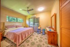  10 Wattle Ave Coconuts QLD 4860 $280,000 Presenting to the market is 10 Wattle Avenue, Coconuts (Innisfail), Qld 4860. This property is in a great location, has no neighbors directly across the street, and is in a quiet neighborhood. If you are a buyer or investor, we are seeking offers above $280,000. Single-story, all-concrete home situated in the Coconuts, a gorgeous suburb of Innisfail, only 5 minutes' drive from the town center. The mouth of the Johnstone River, the beach, and the boat ramp are all only two streets away. A further 2 minute drive will take you to Flying Fish Point Beach, Flying Fish Point primary school and local cafe This solid home has three bedrooms, two of which have split-system air conditioners, an air-conditioned living/dining room, a separate toilet, and a tiled bathroom with a step-in corner shower. A tandem carport on the right side of the house serves as both a parking space for two cars and a space for outdoor entertainment. The house is built on a sizable 1012 m2 piece of land, and the surrounding area is enclosed by high-quality fencing. FEATURES: *Internal brick walls and a solid brick structure *Tiled flooring *A total of 3 bedrooms, 2 of which have split-system air conditioners *Built in cupboards *Original kitchen in an open-concept living space *Front window privacy shutters *Internal laundry *Separate toilet Original decor in the tiled bathroom, with a low step-in shower tandem-style, two-car garage that can also be used as a gathering space. *Quality fencing and a completely fenced yard *Solar Water Heating System *Large, flat 1012 m2 (quarter of an acre), easy to maintain block Pedestrian routes alongside Flying Fish Point Road A boat ramp that provides direct access to the mouth of the Johnstone River, the ocean, the islands, and the Great Barrier Reef is located a short drive from Wattle Avenue. At the beach, there is a playground that is easily accessible, along with a barbecue area and public restrooms. 