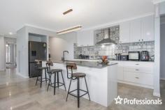  20 Gratton Way Beechworth VIC 3747 $835,000 to $849,000 Uniquely positioned and tucked away in a quiet location, this near new Hadar built home requires nothing to do except unpack and enjoy! Only two years young and offering an abundance of features on a 1,044m² approx allotment, it is sure to impress! Features include: – King sized master suite to the front of the home with ceiling fan, walk in robe plus stylish ensuite. – A further two minor bedrooms with built in robes are serviced by the full family bathroom to the rear of the home. – Two living zones including a formal lounge or media room and an open plan kitchen, living and dining zone (the media room also lends itself to be a potential fourth bedroom). – The well-equipped kitchen boasts Caesarstone benchtops, 900mm cooktop, dishwasher, walk in pantry all overlooking the large living / dining zone with views to outside. – Ducted heating & cooling unit to assure year-round comfort. – Double lock up garage with remote and internal access for your convenience. – Low maintenance grounds and established gardens. – Sliding doors to the undercover alfresco area, perfect for entertaining. – Large home office with built-in cabinetry. – Additional extras include high ceilings, LED lighting throughout, upgraded concrete driveway & solar panels. 
