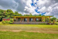 94 Brosnan Rd Vasa Views QLD 4860 $530,000 This low-set, brick-and-tile beauty is nestled in the heart of Vasa Views, just a 5-minute drive away from the CBD of Innisfail. With a land area of 1.04 ha, this property is perfect for those who crave space, tranquilly, and a touch of luxury. A contemporary kitchen that would make Gordon Ramsay happy will greet you as you enter. The air conditioning will keep you cool as a cucumber during those scorching Queensland summers, while the scenic views will make you feel like you're living on a postcard. But wait, there's more! 3 great-sized bedrooms, and the main boasts an ensuite,so you can soak in the shower and forget all your troubles. A lounging area big enough for the growing family, a garage to keep your prized possessions safe, and a verandah/deck to enjoy the stunning sunsets with a glass of wine. And don't worry about storage, because the built-in robes have covered you. Now, let's talk about entertainment. This property has a large balcony, so you can host the most epic BBQ parties your friends have ever seen. And if you need to get away from it all, just take a stroll in your massive backyard. But don't just take our word for it; come and see for yourself! With its close proximity to transport and bus routes, this property is the perfect blend of rural charm and urban convenience. So, what are you waiting for? Come and make 94 Brosnan Road your new home, and start living the dream! (pick your own floor covering. for the bedrooms.) 