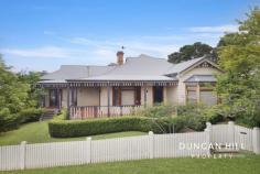  6 Oxley Dr Mittagong NSW 2575 $1,750,000 The allure of a traditional charming country home set on a classic Old Mittagong level block is something that never tires and this c1888 beauty is no different. With its pretty hedged entry, wraparound veranda, sprawling gardens and all the classic interior features that enhance its warmth and charm, this property is quite special and bursting with potential. A conversion of the garage could work as extra accommodation if needed, with its own kitchen and toilet already in place in the former “Mini Brewery”. Opportunities such as this are as unique as they are exciting, and add to that a premium location, with an easy walk to Mittagong CBD as well as Mount Gibraltar trail walks, this is an offering that should be grabbed with both hands! Please get in contact and we can introduce you. Ducted gas heating | Original wood heater | Fireplace 12-foot ceiling height | Original timber floors Renovated bathrooms in period style | Original laundry tub Bosch dishwasher | AEG Oven | Highland gas stove 