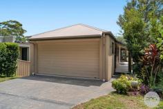  21 Albacore Drive Corlette NSW 2315 Surrounded by well-maintained residences in a family-friendly neighbourhood, this free-standing, low maintenance home offers both space and convenience in a street known for its pride in homeownership. As you approach, you're greeted by lush gardens framing the entrance, hinting at the care and attention to detail found within. Stepping inside, the open-plan living, kitchen, and dining area immediately captivates with its polished timber floorboards, contemporary downlights and the comfort of split-system air conditioning. This space effortlessly transitions from casual family living to hosting gatherings with friends and loved ones. The kitchen boasts a welcoming ambiance, abundant cupboard & bench space and a suite of high-quality stainless-steel appliances, making meal preparation easy. Beyond lies an outdoor undercover balcony, where leafy green trees provide a tranquil backdrop for moments of relaxation and enjoyment. Also located on the main level is the spacious master bedroom, allowing you the opportunity to live on the one level. Featuring an ensuite, build in robe and ceiling fan. Downstairs offers two generously proportioned bedrooms and a rumpus room, the ideal space for the kids seeking comfort and privacy. Towards the rear, a low-maintenance manicured backyard awaits, complete with verdant trees enhancing the sense of serenity and privacy. For added convenience, a double lock-up garage provides secure parking for vehicles, while the home's proximity to Salamander Bay Shopping Centre, schools, parklands, and beaches ensures easy access to essential amenities and leisure activities. Whether unwinding at home or exploring the surrounding area, this property offers a harmonious blend of comfort, style, and convenience for even the most discerning buyers. 