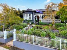  279 Gray Street Hamilton VIC 3300 $829,000 Lovingly built in 1910 and enviably set in this exclusive town pocket on a lush 1,190m2 (approx.) parcel of land, the grand scale of this stunning Victorian federation home and its exquisite location must be seen to be truly appreciated. Often sought after, yet very rarely found, this prestigious property merges the lines between Entertainers Dream, Workshop/Studio Haven and divine Family Sanctuary. Securing classy features of a bygone era, including ornate Victorian lattice work around the spacious front veranda, stunning 11-foot (approx.) high ceilings with decadent ceiling roses and gorgeous, polished timber floorboards, an elegant bay window and exquisite fireplaces and mantels (including 1 classy marble mantel) – an inspection of these elements alone will make your heart sing! Presented in pristine condition this grand home offers 4 vast bedrooms (two with built in robes), 2 brand new modern bathrooms (including semi freestanding bath, wall hung vanities, face level storage, striking large tiles and modern black tapware), 2 luxurious living areas with picture perfect vistas (one that used to function as the Ballroom), a light drenched dining area that opens across to the charming sunroom and calming reading nook and flows effortlessly out to the huge undercover alfresco that will have you entertaining friends and family all year round. The centre of the home is drenched in natural light and offers a luxurious kitchen (including wall mounted oven and grill, microwave nook, 4 burner induction cooktop, double stainless steel sink, breakfast bar, glass display cabinets, central island, pantry and an abundance of bench space and cupboards) – this sophisticated kitchen will genuinely delight the most fastidious of chefs. The lush grounds have a Botanical Gardens grace to them and showcase elegance and beauty that is beyond compare and includes magnificent established trees and divine low maintenance garden beds that enchant throughout the seasons. This once in a lifetime property ingeniously integrates strong connections between indoor and outdoor living and will have you hosting friends and family all year round. To round out this sensational package there is terrific side access off Dinwoodie Street to the double lock up garage (on concrete with lights, power, rear lean too for extra storage and a convenient outdoor toilet), plus double gate entry for further off-street parking to cater for the caravan/trailer, an inspiring large separate Studio/Workshop (on concrete with lights and power), huge separate garden shed and lovely glass house – this period masterpiece truly is a one in a million and secures you a genuine lifestyle investment for now and the future! Centrally located between picturesque Lake Hamilton, bustling Hamilton Hospital, the thriving town centre and Cafe precinct, the lush Botanical Gardens and Parks and the multi-million-dollar HILAC indoor swimming and sporting facilities – this charm filled private oasis truly has it all. This magnificent location is only a 20-minute drive to Dunkeld as the gateway to the Grampians, 45 minutes to Port Fairy beach or a 1-hour drive to Warrnambool and the start of the world-famous Great Ocean Road. Simply move in here, pop the kettle on and enjoy this timeless masterpiece from day one. 