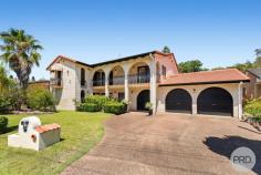  6 James Paterson Street Anna Bay NSW 2316 $1,225,000 Boasting a unique, Mediterranean-style façade and a solid brick construction, this incredible family residence showcases a perfect blend of elegance and durability. Nestled in an enviable beachside location, this residence is a haven for families aspiring to embrace the coastal lifestyle. Upon arrival, prepare to be captivated by timeless charm featuring arched doorways, terra cotta roof tiles and decorative wrought iron details. Situated on a spacious 567-square-meter block, the home offers a sense of openness and tranquillity. The front living room welcomes you with its generous proportions, eliminating any need to compromise on space. The fireplace here adds a touch of coziness, creating the perfect ambiance for chilly evenings. The heart of the home is the large kitchen, boasting an abundance of cupboard space and a convenient breakfast bar. The thoughtful, open-plan design seamlessly connects the kitchen to the dining and living areas, providing a versatile space for family gatherings and entertaining guests. Expansive glass doors further enhance the sense of openness, allowing a wealth of sunlight to fill the interior. Step outside onto the expansive deck that overlooks the lush green lawn, providing the perfect setting for outdoor activities, relaxation and entertaining family and friends. This coastal haven features five bedrooms, each equipped with ceiling fans for optimal comfort. The home office, with its adaptable design, can easily be converted into a sixth bedroom to suit your family's needs. With the ease of parking in mind, the property offers a triple garage, side access and an expansive shed, offering ample space for multiple vehicles or additional storage. Backing onto bush reserve before the Birubi Sand Dunes completes the package here plus the proximity to key amenities further enhances the appeal of this residence. With Birubi Beach just 980 meters away, Anna Bay Village Shops, cafes, and restaurants within 280m, and Anna Bay Public School conveniently located 900 meters from your doorstep. This home is a perfect blend of style, functionality, and location, providing a haven for families seeking a vibrant coastal lifestyle. 