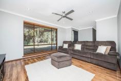  16 Fletcher Road Lesmurdie WA 6076 $989,000 Set in this PEACEFUL & QUIET location overlooking beautiful Seaton Park (with its pretty creek, walk trails, playground), is this beautifully renovated & immaculately kept 4-bedroom 2-bathroom brick home on a MINIMAL CARE & fully landscaped 1,503m² block. Featuring 2 separate living areas, a galley-style kitchen with granite bench-tops & generous cupboard storage spaces, good-sized bedrooms, a massive alfresco area complete with a built-in barbeque area & fire pit, this gorgeous property will suit a myriad of buyers: Those who love to entertain - huge alfresco area and the landscaped gardens provide a beautiful backdrop for those larger parties / family gatherings; The young family - plenty of lawned area for the kids to play and there is also the playground across the road! The family with older kids - the master bedroom is conveniently located at opposite ends of the house from 2 other bedrooms, with parking space for additional cars. The downsizer - for those of you looking to downsize to a smaller & easy-care block but not wanting to compromise on the size of the house. There is absolutely no work required here - just move in and enjoy all that this gorgeous property has to offer. So call Emily Tan or Angela Padula now to view & secure this gorgeous property! Property Highlights: beautiful timber-look flooring 4 great-sized bedrooms 2 bathrooms formal lounge overlooking the park open-plan family, dining & kitchen galley-style kitchen with granite tops, dishwasher, 900mm oven & pantry massive alfresco area shaded area at the front of the house for relaxing & enjoying park views reverse-cycle air-conditioning slow-combustion wood heating a 3.85kW photovoltaic system (solar panels) security system 3 garden sheds landscaped & terraced backyard with built-in fire pit & seating double garage (with extra height clearance) additional parking space for a caravan or boat 1,503m² minimal care block great central location, within an easy walk to shops and public transport, and close to local schools including St Brigid's College and Kalamunda Christian School approximately 15km to Perth airport and 25km to Perth CBD 