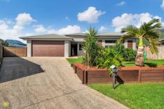  8 Taffy Close Gordonvale QLD 4865 $698,000 Welcome to your new home … 8 Taffy Close, Gordonvale Therese Plath says "the living is easy in this private impeccably presented family residence". Set in a family friendly area this quality home is an ideal retreat for busy families with spacious living areas merging seamlessly through outside entertaining. Tucked away at the end of a close in Gordonvale, this home offers the perfect sanctuary for family's seeking convenience. In a quiet close positioned on a 725m2 block close to local shops shopping centre and schools and a short 25 minute drive to Cairns CBD. This very generous home presents a striking minimalist creation that offers "life" and "style" in equal measure -an innovative floor plan that creates an intimate relationship between every room. This fusion of light and openness is complemented throughout the home. Upon entry, you'll be captivated by the spacious open-plan living area, seamlessly integrating the designer kitchen, dining, and living spaces. The well-equipped modern gourmet style kitchen overlooks the adjoining dining area and features stylish stone bench tops and sleek cabinetry with soft closing drawers, extensive storage, with walk in pantry ensuring optimal functionality with premium stainless steel appliances, including 5 burner gas cooktop and oven which services the comfortable living area. Entertain in style on the undercover rear patio, featuring polished concrete flooring and roller blinds for added privacy and shade. Step outside to discover your own private oasis, complete with a sparkling swimming pool. Imagine lazy afternoon relaxing around the swimming pool enjoying the lovely views to the surrounding mountain backdrop. The parents retreat offers expansive space with luxurious en-suite and large walk in robe and the other 3 bedrooms enjoying easy access to the generous family sized bathroom with the bonus of the 5th bedroom having its own en-suite. Separate office or could be a bedroom. The home is fully air-conditioned and security screened with an abundance of storage plus double remote car accommodation and the back garden is fully fenced providing a safe haven for children and pets. Additional features include: internal laundry plus a linen closet double remote garage with internal access fully fenced rear yard including easy side access, providing security and convenience 10.8 kW solar system auxiliary power point for a generator 6m x 4m shed, offering ample storage space for all your needs 