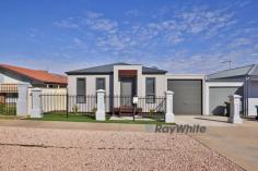  7/271-285 Tenth Street Mildura VIC 3500 $235,000 - $258,000 Welcome to Westside Gardens Residential Village, where refined living meets tranquility. This impeccably maintained unit graces the front of the complex, facing Tenth Street, and offers a remarkable blend of convenience and prestige. With laneway walking access to the lush grassy parkland and the Village Community Centre, you'll enjoy a harmonious connection to nature and a vibrant community. Designed exclusively for over 50's, this purpose-built residential village is nestled in a coveted blue-chip location, within easy reach of the CBD and essential services. Step inside this exceptional unit and be captivated by the thoughtful features that enhance your everyday living. The generous kitchen boasts a gas cooktop and dishwasher, allowing for culinary delights in an elegant setting. Neutral tones, complemented by modern fixtures and fittings, create a harmonious ambiance throughout. The master bedroom is a haven of tranquility with its spacious walk-in robe, providing ample storage space and a touch of luxury. The second bedroom features a built-in robe, combining functionality and style. Enjoy year-round comfort with the reverse cycle split system air conditioning and ceiling fans, ensuring a pleasant climate in any season. Outside, the remote access roller door of the garage offers secure parking, while a covered outdoor area invites you to unwind and revel in moments of relaxation. Westside Gardens Residential Village offers an array of amenities and services covered by a weekly maintenance fee of $110.50. Immerse yourself in the well-appointed community centre, featuring a kitchen and BBQ facilities, indoor sports activities, and outdoor entertaining areas amidst beautifully manicured lawns and gardens. The fee also includes Mildura Rural City Council Rates, encompassing all council services, as well as Lower Murray Water Sewage & Water Tariffs (usage costs borne by occupants). Each home is equipped with independent meters for all services, ensuring transparency and control. General village maintenance and a direct link to a security company and emergency services provide added peace of mind. 