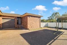  Unit 3/71 Macquarie Ave Cessnock NSW 2325 $400,000 Enjoy a rural outlook with an affordable 2-bedroom unit. Suited perfectly for investors, downsizers and first home buyers alike! – Two light filled bedrooms with built-in robes, main bedroom featuring ceiling fan. – Two-way bathroom with separate shower and bath. – Functional open plan kitchen with ample storage, electric cooktop and oven with split system air-conditioner. – Spacious laundry with built-in storage. – Easily maintainable backyard – Recently painted with brand new downlights throughout. – Lockable single car garage. 