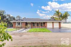  35 Twartz Rd Roseworthy SA 5371 $980,000 - $1,020,000 Welcome to 35 Twartz Road, Roseworthy – a modern and spacious family home that offers a perfect blend of comfort, style, and functionality. Situated on a massive 1.185 hectares approximately (just under 3 acres), this property is designed to cater to all your living needs, providing ample space both indoors and outdoors. The home boasts five generously sized bedrooms, ensuring plenty of room for the entire family. The main bedroom is a true highlight, featuring a charming bay window that allows natural light to flood in, an ensuite with double basins for added luxury, and a walk-in robe for ample storage space. Most of the other bedrooms are equipped with built-in robes, providing convenient storage solutions. Living space is abundant in this home, with two living areas and the potential to convert a space into a third living area, offering flexibility for various needs. The large gaming room is perfect for entertainment and leisure, ensuring there is always a space for fun and relaxation. The dining area is spacious and ideal for family gatherings and dinner parties, making it a central hub for socialising and dining. The stylish kitchen is well-appointed with modern fixtures and fittings, ensuring that meal preparation is a pleasure. Floating floorboards throughout the home add a touch of elegance and are easy to maintain, enhancing the overall aesthetic appeal of the interiors. Comfort is paramount in this property, with evaporative air conditioning to keep you cool during the summer months and combustion heating for warmth during the cooler seasons, ensuring year-round comfort. The outdoor space is equally impressive. The property’s street appeal is undeniable, with its freshly painted interior and well-maintained exterior. The fantastic large entertaining area is perfect for hosting gatherings, barbecues, or simply enjoying the outdoors with family and friends. A standout feature of this property is the extensive shedding and workshop space. There is a massive shed with three-phase power, making it suitable for a variety of heavy-duty tasks and providing ample storage space. The double carport offers convenient parking for multiple vehicles. Also ideal for those who would like to run a business from home, as there’s plenty of room for trucks and storage. Sustainability is a key feature of this property, with solar panels installed to significantly reduce energy costs. The property is also equipped with two substantial 22.5-litre rainwater tanks, which are plumbed into the entire home, promoting an eco-friendly and cost-effective lifestyle. The expansive outdoor area provides endless possibilities for activities, gardening, or future expansion. Whether you’re looking to create a lush garden, a play area for children, or a serene retreat, the vast space offers flexibility to cater to your vision. In summary, 35 Twartz Road, Roseworthy, is more than just a home; it’s a lifestyle. With its modern amenities, spacious interiors, and extensive outdoor space, this property offers a unique opportunity to enjoy comfortable, stylish, and sustainable living. Don’t miss the chance to make this impressive property your own and experience the best of both indoor and outdoor living. 