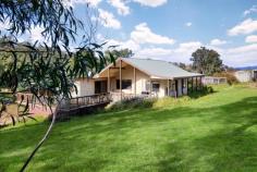  707 Peach Tree Road Megalong NSW 2785 $1,100,000 Located in the heart of the beautiful Megalong Valley, this rural acreage is less than a two hour drive from Sydney. Opening up to the most glorious views, the homestead is set off the newly sealed approach road and is set on approximately 6.45 acres. The dual level home is much more extensive than it initially appears. The centrally placed open plan kitchen flows through to generous living areas and surrounding decking that take advantage of views looking out over the dam and granite-lined gully. A huge Council approved boarding cattery, currently not utilised, that is located in a large purpose built building, provides potential opportunity for those with vision. Breakdown of Features: Comfortable, spacious two level home, ideal for entertaining Extensive insulation, double glazing in living areas, two telephone lines one with ADSL Mains and 10Kw solar power, 120,000 litres tank water Two fenced paddocks, dam, enclosed vegetable garden, orchard area and multiple chook runs Four double bedrooms, fifth room utilised as a study Bathrooms on each level; multiple storage cupboards Plenty of scope to further capitalise and redesign according to personal preference True escape for those seeking a blank canvas and peaceful retreat opportunity 